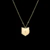 Star Set Diamond Shield Locket in Yellow Gold